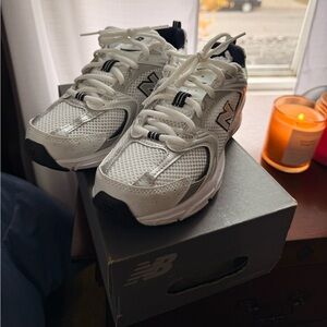 New Balance White and Black Sneakers